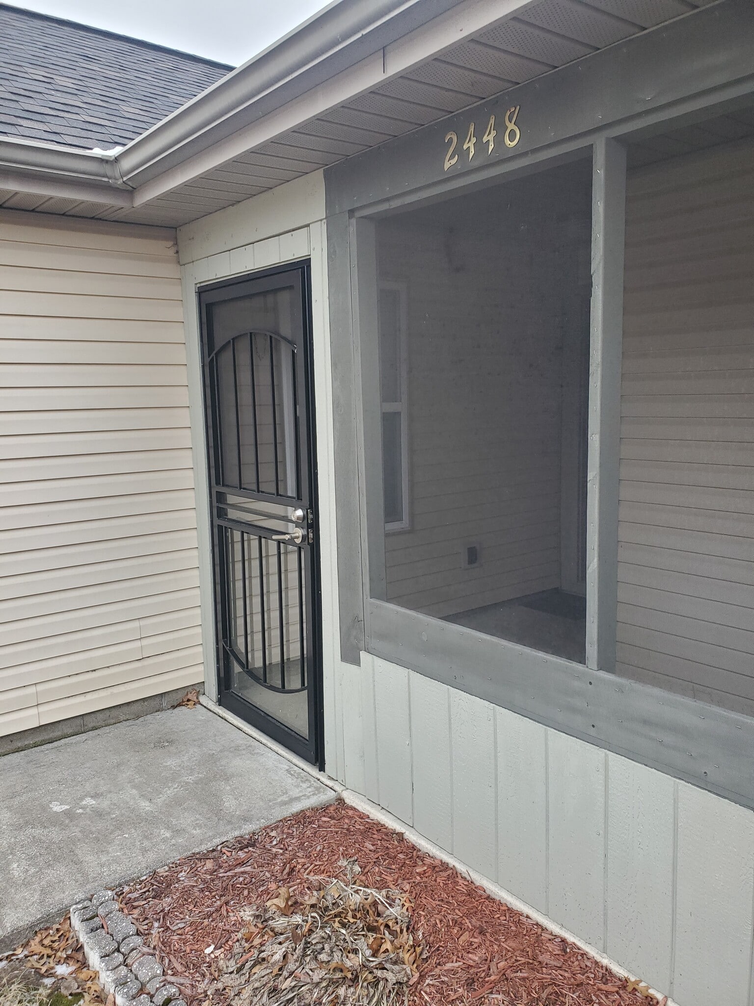 Security door with screened in porch - 2450 Hopkins Dr