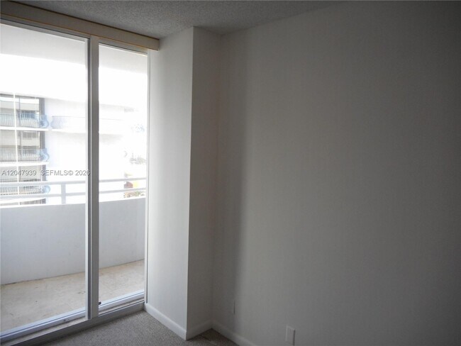 Building Photo - 8911 Collins Ave