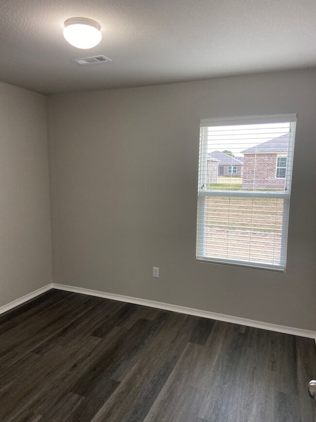 Building Photo - NOW AVAILABLE — Spacious Living in This 4-Bedroom | 2-Bath Conrad Court Home