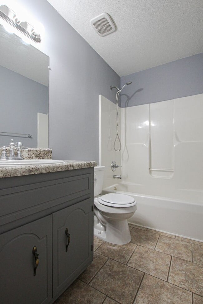 Building Photo - Pet Friendly Three Bedroom with Basement!