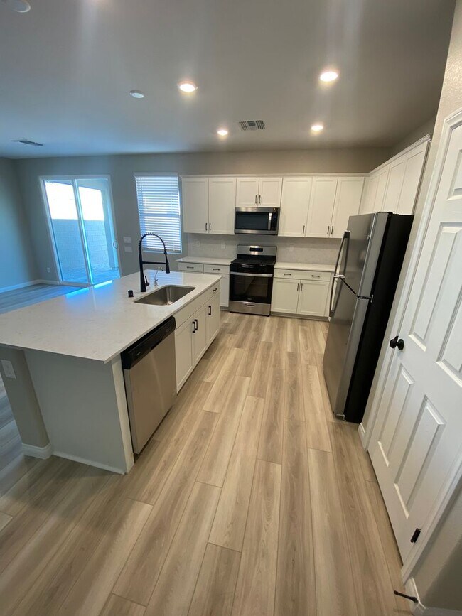 Building Photo - Americana Property Mgmt - 2022 built 4 bedrooms in prime South West Las Vegas