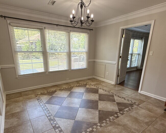 Building Photo - "Charming 4-Bed Oasis with Granite Finishe...