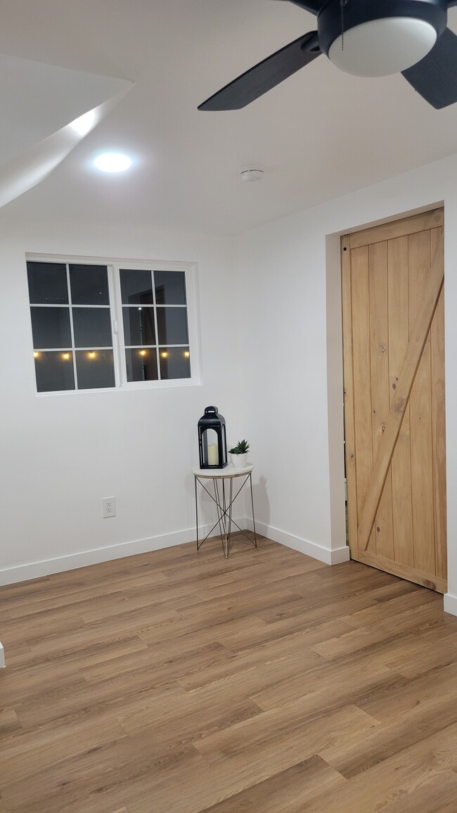 Barn door entrance to bedroom area - 1274 N Hamilton Blvd