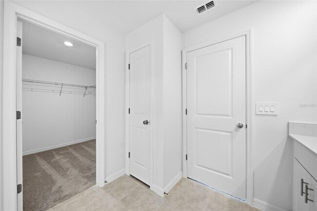 Building Photo - 8879 Coqui Song Ln