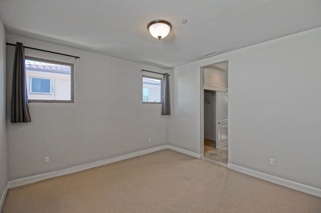 Building Photo - BUILT IN 2019: SPACIOUS & BRIGHT, DETACHED TOWNHOUSE W/ 2-CAR GARAGE & FENCED YARD IN GREAT RESID...