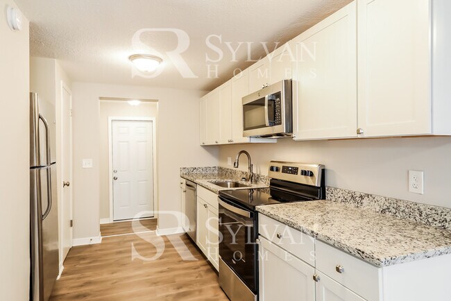 Building Photo - The living is easy in this 3 bedroom, 2 bathroom home!