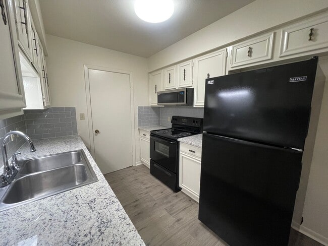 Building Photo - A Great Place to Call Home! Master Bedroom and Bath Downstairs!