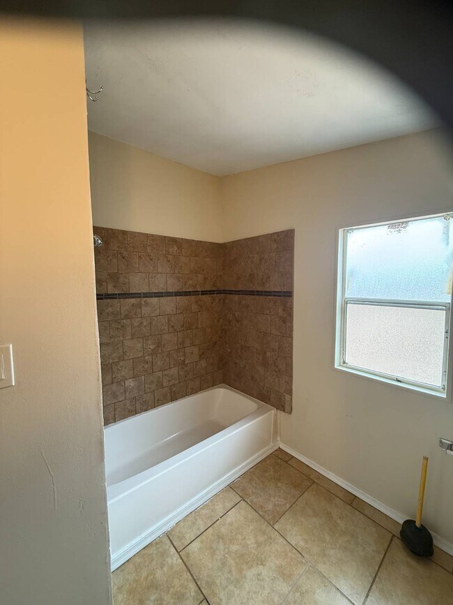 Building Photo - 6575 N Pelto Path