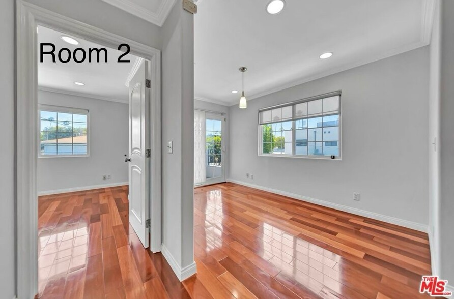 Primary bedroom w/ bathroom. - 3242 Hutchison Ave