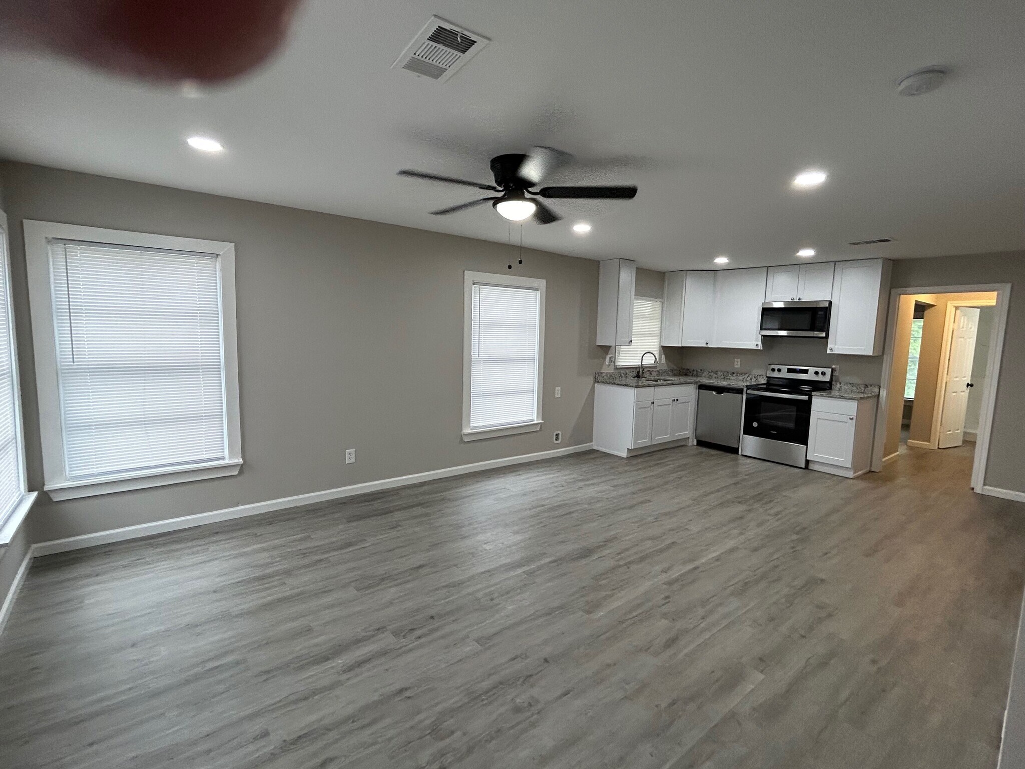 A beautiful open concept Living Room and Kitchen. - 2245 E Overton Rd