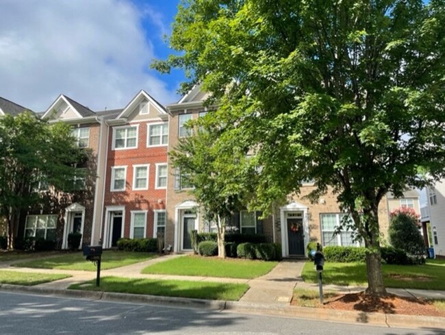 Building Photo - This Stunningly Tri-Level Town Home is Loc...