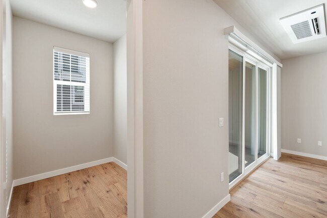 Building Photo - NEW CONSTRUCTION – Stylish 4-Bedroom Townh...