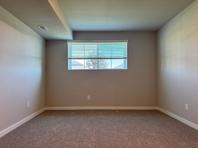 Building Photo - Spacious 4-Bedroom Split-Level Near Standing Bear Lake & Trails