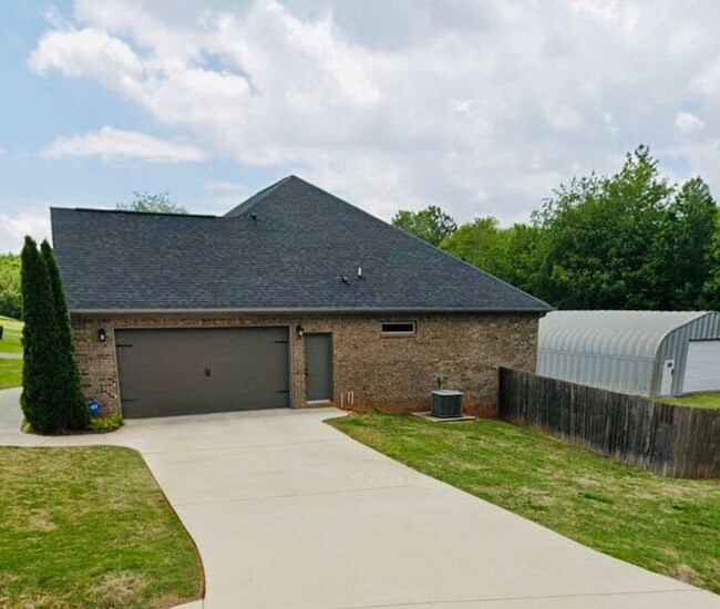 Building Photo - Custom Built Home with Fenced Yard
