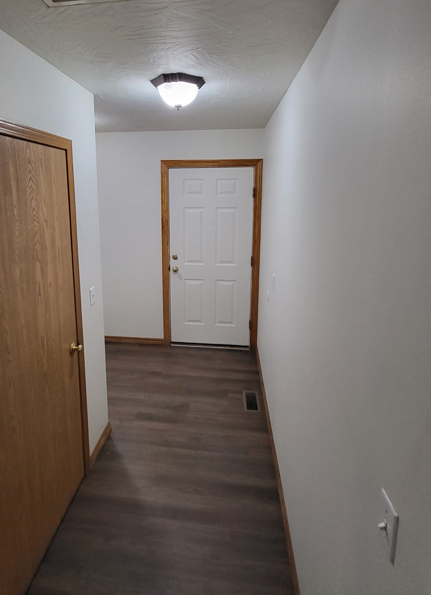 Hallway to Mechanical Room, Landry Area, and Garage - 2675 N National Ave