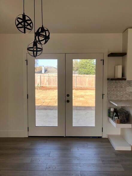 French doors to deck and backyard - 7810 Copperas Dr