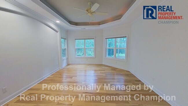 Building Photo - Custom 4BD/3BA Home with Hardwood Floors, Office, and Sunroom