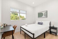 Building Photo - A 3 Bedroom apartment with ensuite bathrooms, common areas and a fully functional kitchen at 1736...