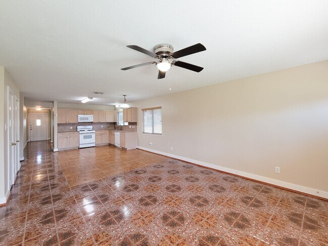 Building Photo - 3 bedroom one story home on large corner lot. Home has hard flooring throughout living areas and ...