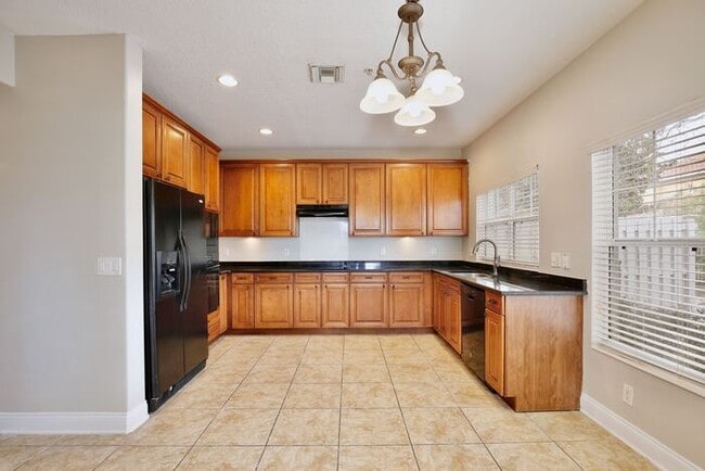 Building Photo - AGENT SHOWINGS ONLY! Stunning 3/2.5 Corner Unit Townhome with a Spacious 2 Car Garage in the Gate...