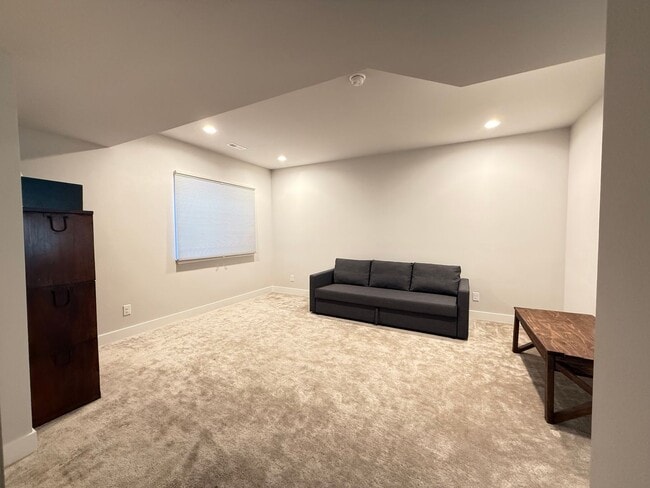 Building Photo - Stunning Luxury Living in Coal Creek with ...