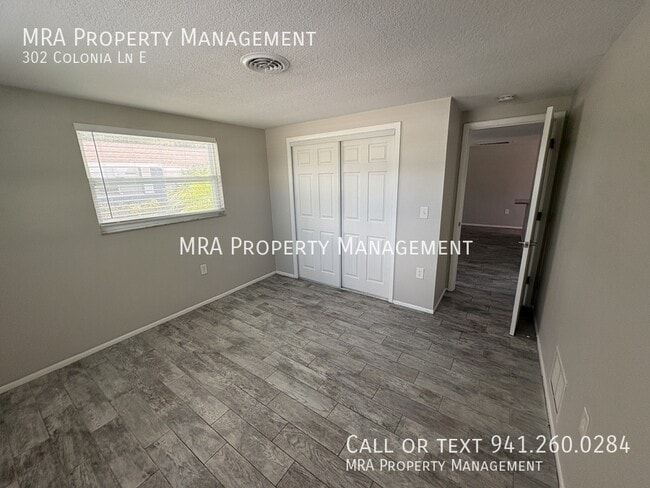 Building Photo - 302 Colonia Ln E