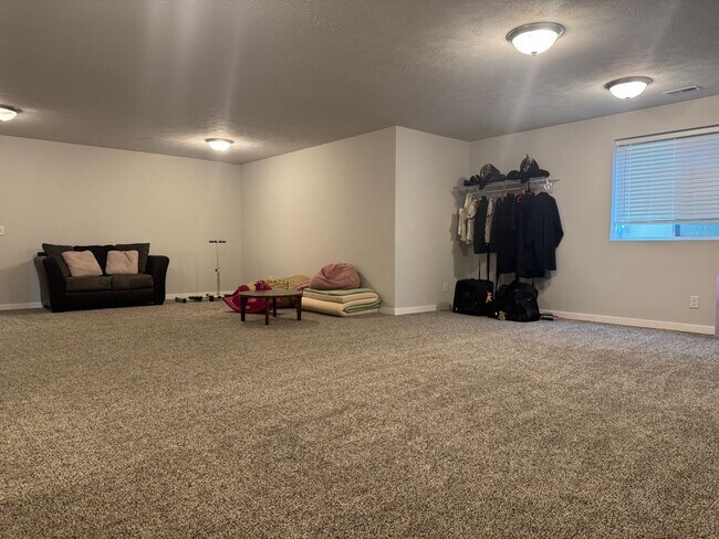 Building Photo - Spacious 4-Bedroom Ranch with Finished Basement & 3-Car Garage