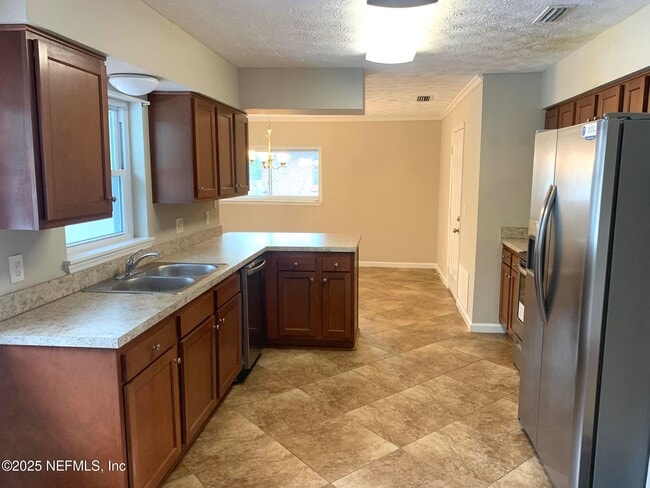 Building Photo - 7751 Lisa Dr E