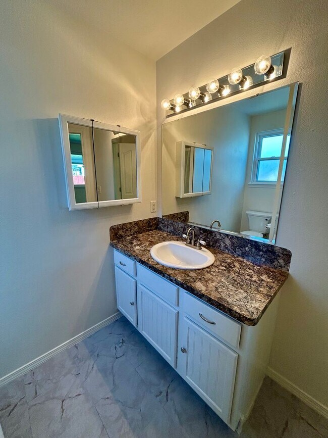 Building Photo - Spacious 4-Bedroom Home with RV Parking & No Backyard Neighbors