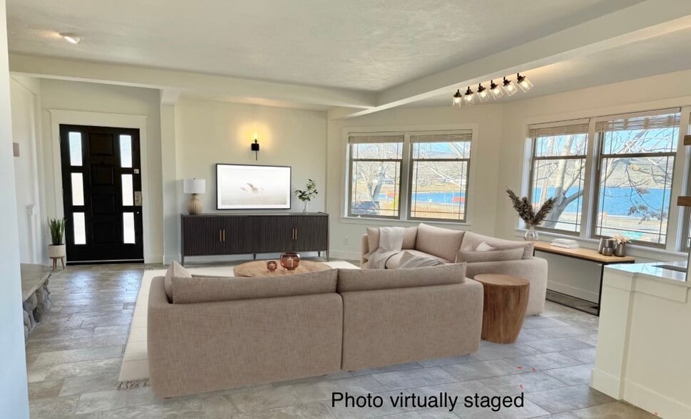 Virtually staged living room with view of lake - 24 Ash St N