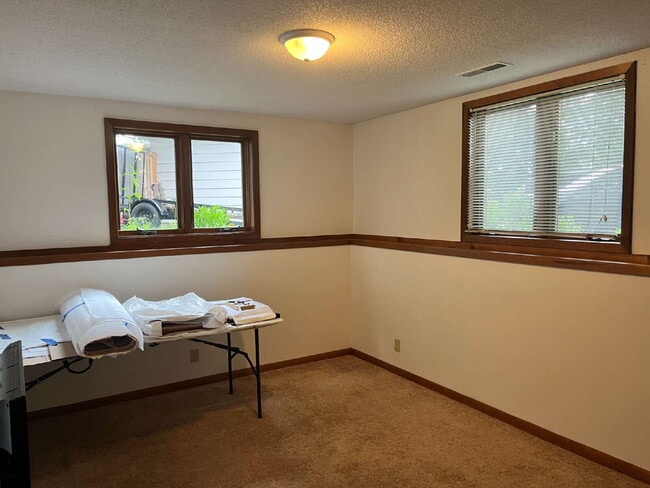 Building Photo - Spacious 4-Bedroom Home with Fenced Yard, ...