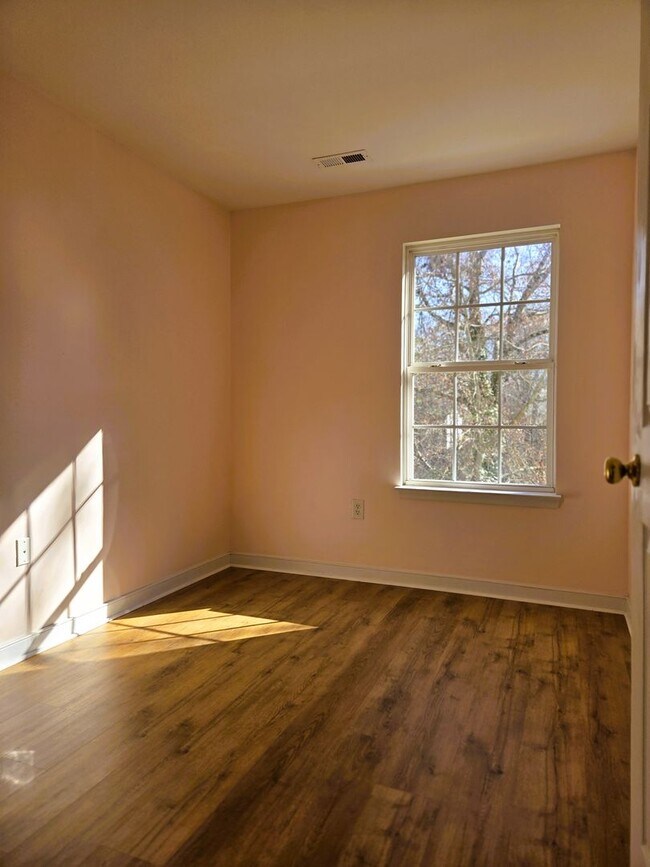 Building Photo - Ashley Village Townhome with all new LPV flooring and paint.