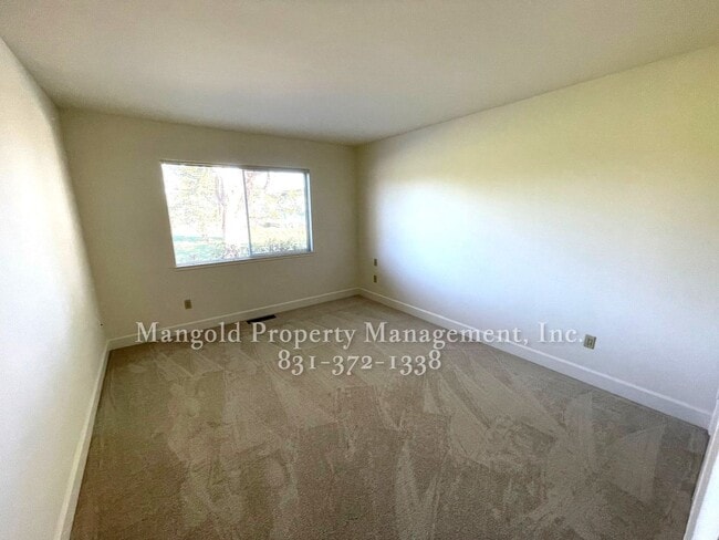 Building Photo - Beautiful 4-bed 2-bath Home with Cozy Fireplace, Front and Back Yards and Large Windows!