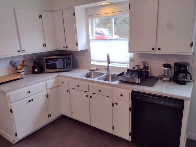 All new appliances and a well-tooled kitchen. Microwave, coffee maker, tea kettle, slow cooker, blen - 4157 SE Brooklyn St