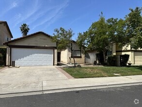 Building Photo - Modesto 3 Bed 2 Bath 2 Car Garage HOA Swim...