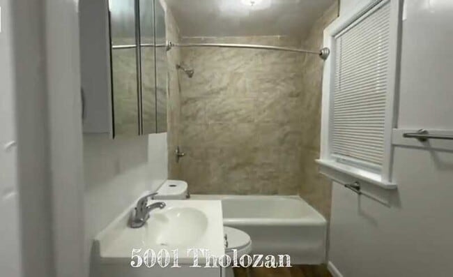 Building Photo - 5001 Tholozan Ave