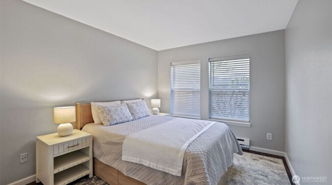 Building Photo - Great location, quiet first floor end unit...