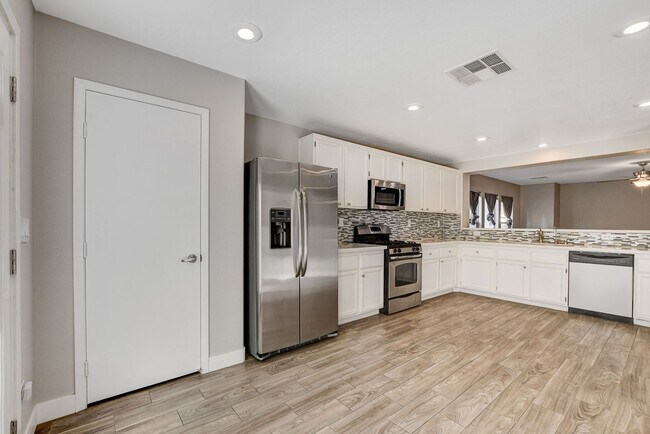 Building Photo - Totally Updated Solar Powered 4 Bedroom! B...