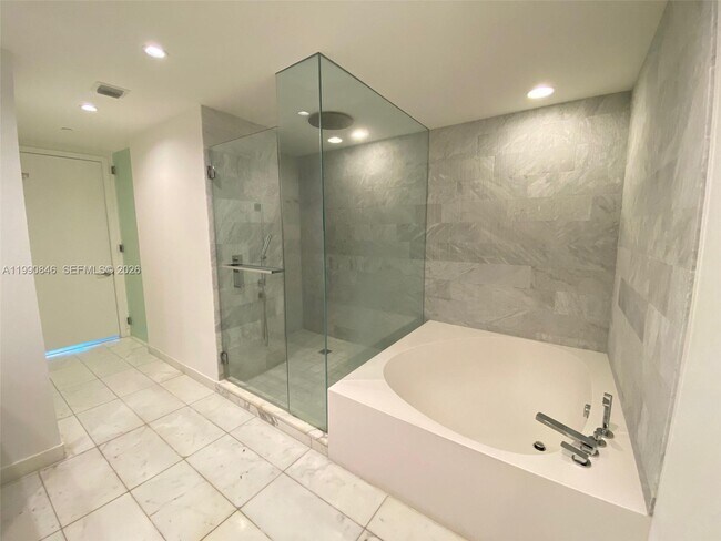 Building Photo - 10203 Collins Ave