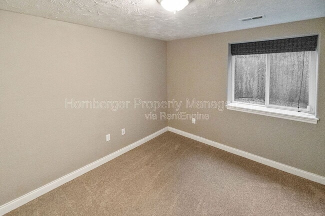 Building Photo - 6415 S Woodland Ct