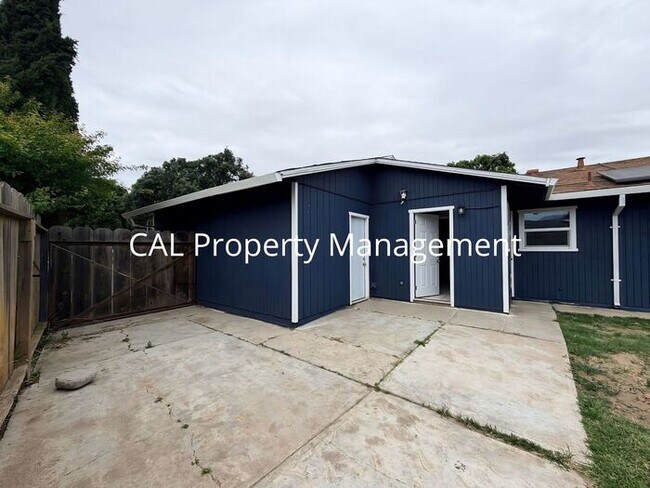 Building Photo - Spacious 4-Bedroom Home with 2-Car Garage & Backyard Oasis