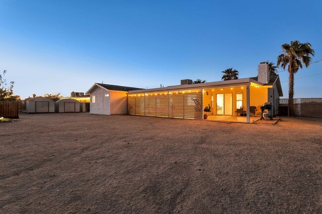 Building Photo - A Fully Furnished 3 Bedroom With Desert Mo...