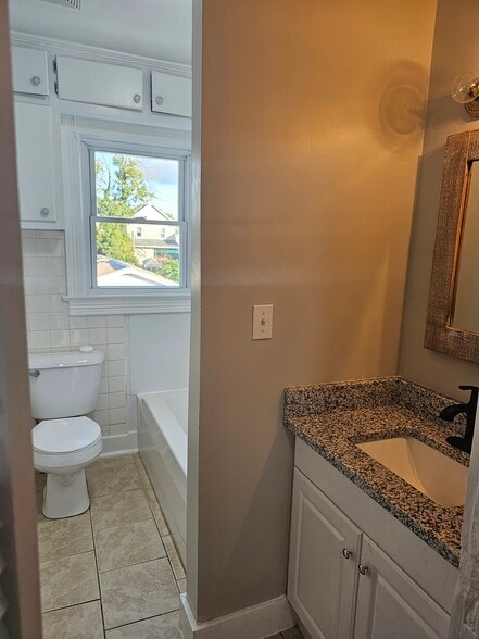 Upstairs full bath - 226 S Illinois Ave