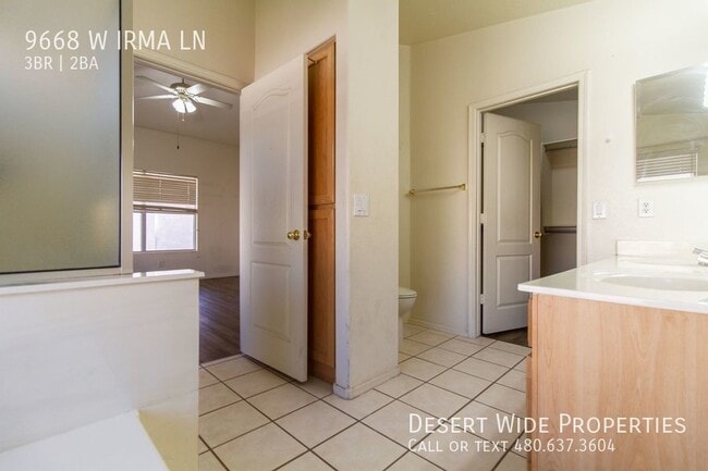 Building Photo - 9668 W Irma Ln