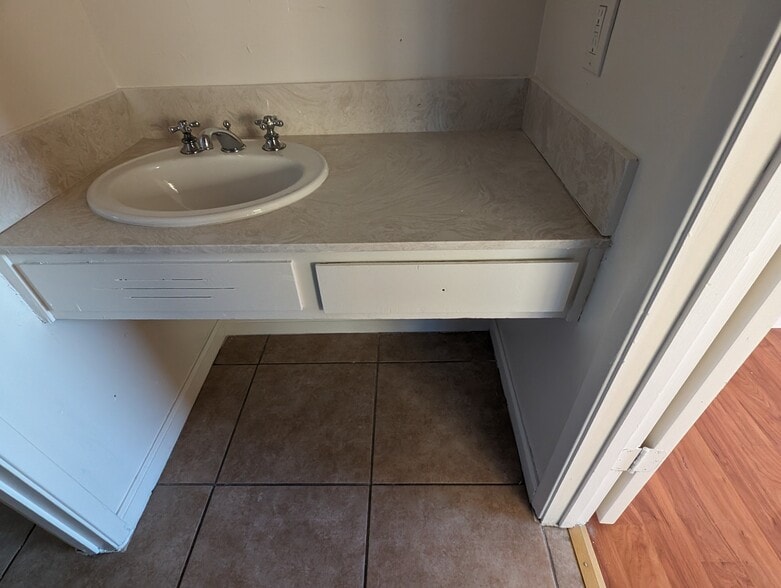 Sink across from shower stall - 251 Coventry Dr