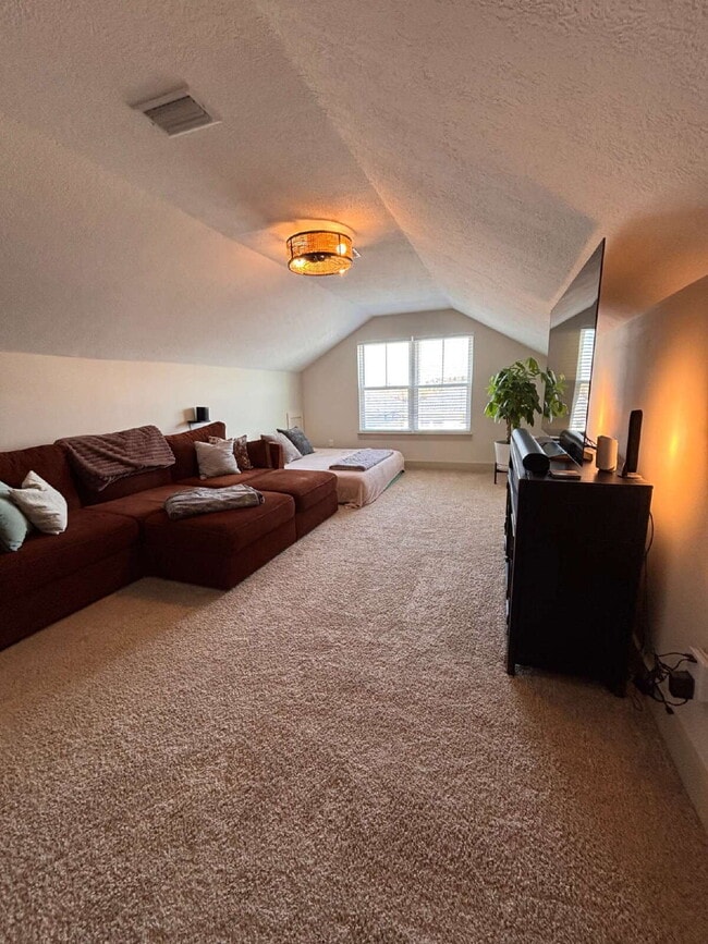 Building Photo - Need Space?  How about 5 bedrooms, 2.5 baths + an extra bonus area upstairs so that the kids can ...