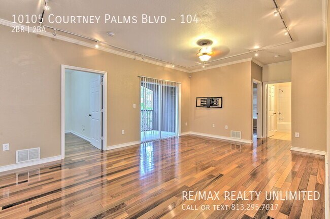 Building Photo - 10105 Courtney Palms Blvd