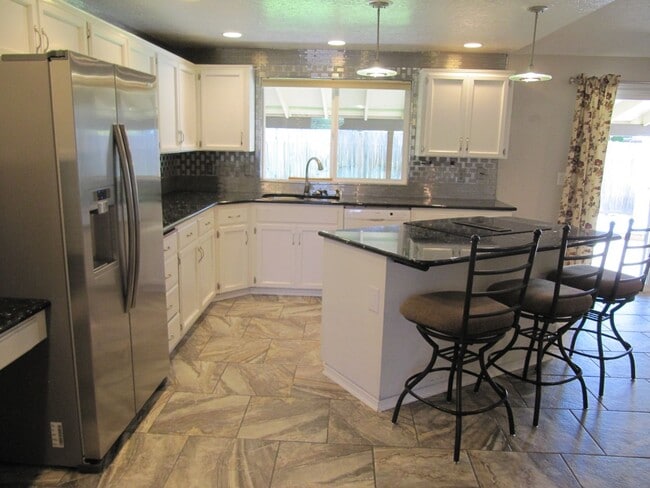 Building Photo - Gardener's Dream on Huge Lot with Landscap...