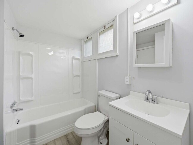 Building Photo - Completely renovated 1-bedroom, 1-bath apartment with LVP flooring with off-street parking