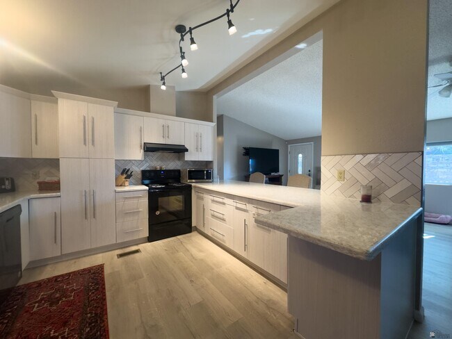 Building Photo - 13239 E 49th Dr